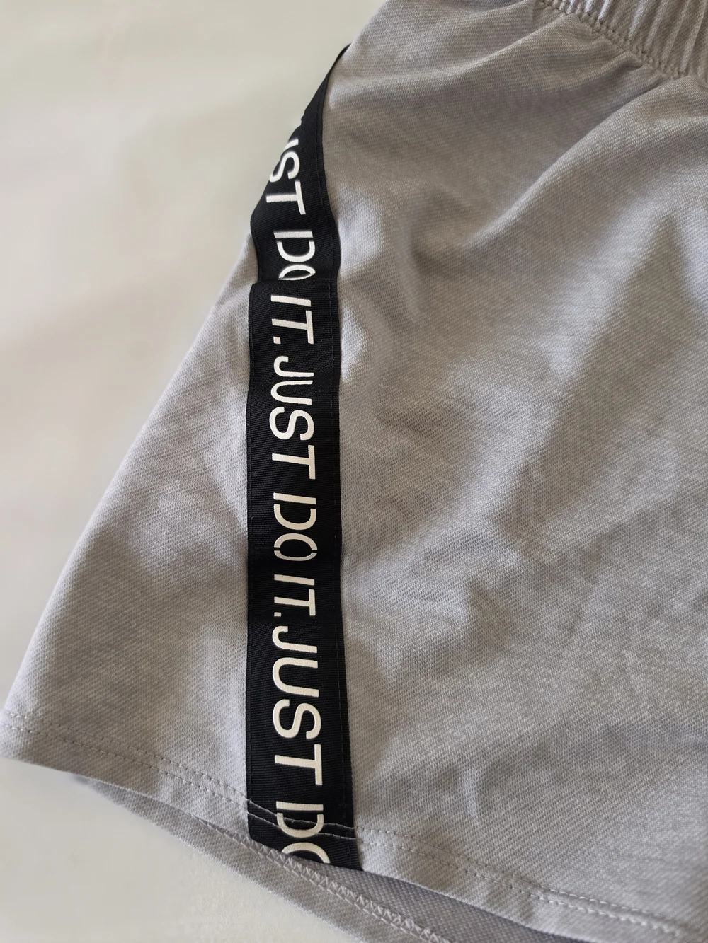 Nike Gray Women's Athletic Shorts with 'Just Do It' Trim